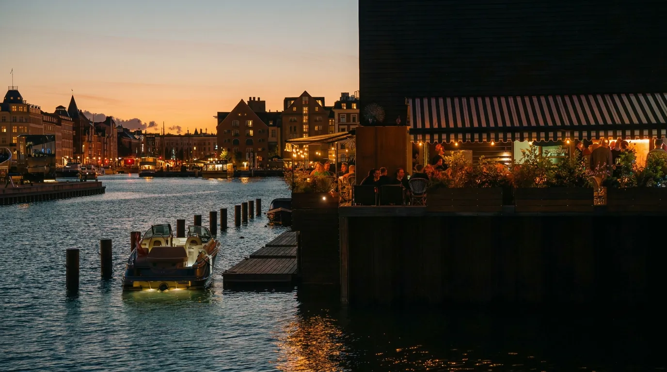 P88 café terrace on Papirøen overlooking Copenhagen harbour at sunset